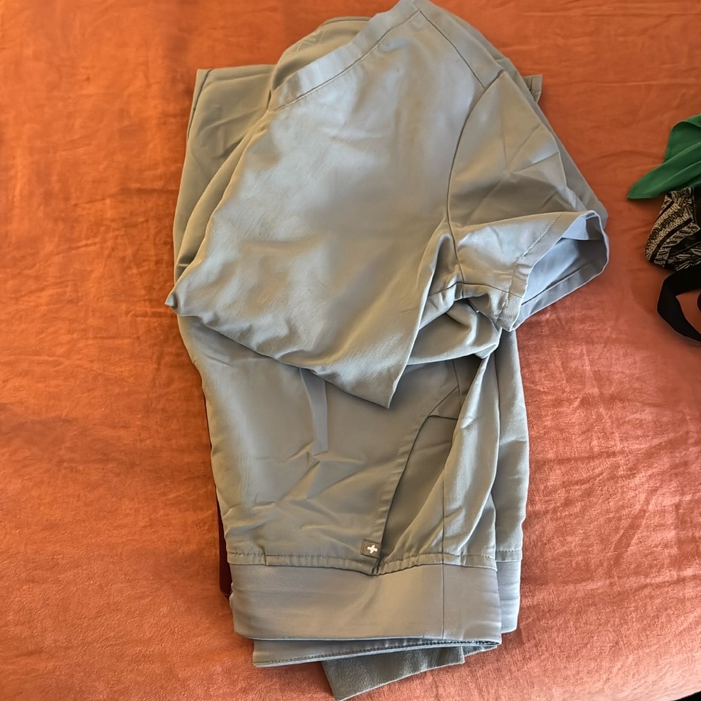 Figs scrubs- Small 2-pocket Top and Medium/Tall Jogger pants; matching colors